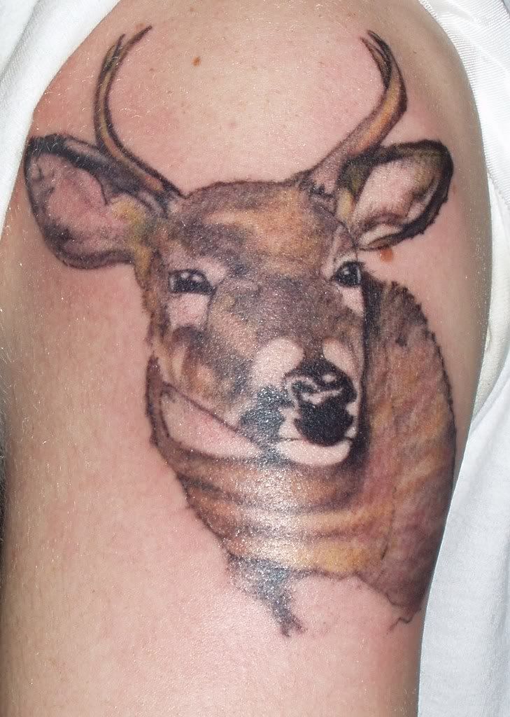 He chose to get a Tattoo of his first Deer the 4 Pointer here are a couple