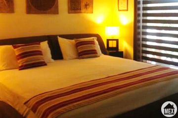 Furnished bedroom in condo for sale on Playa del Carmen real estate market 