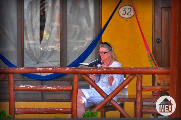woman in a balcony beachfront