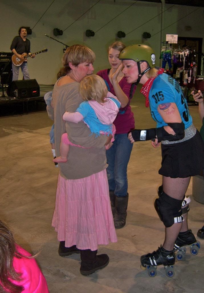 Jesse Kaboom with roller derby fans