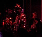 Bootsy and horns in the dark