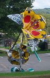 yellow metal sign flower