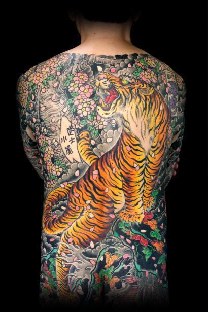 Tiger tattoos in Body Art Design,henna,permanent,tribal,animal
