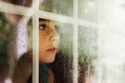  photo boy-looking-out-window-in-the-rain_zpsizpguoi0.jpg