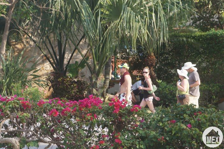 People walking through Playacar, Playa de Carmen Comunity